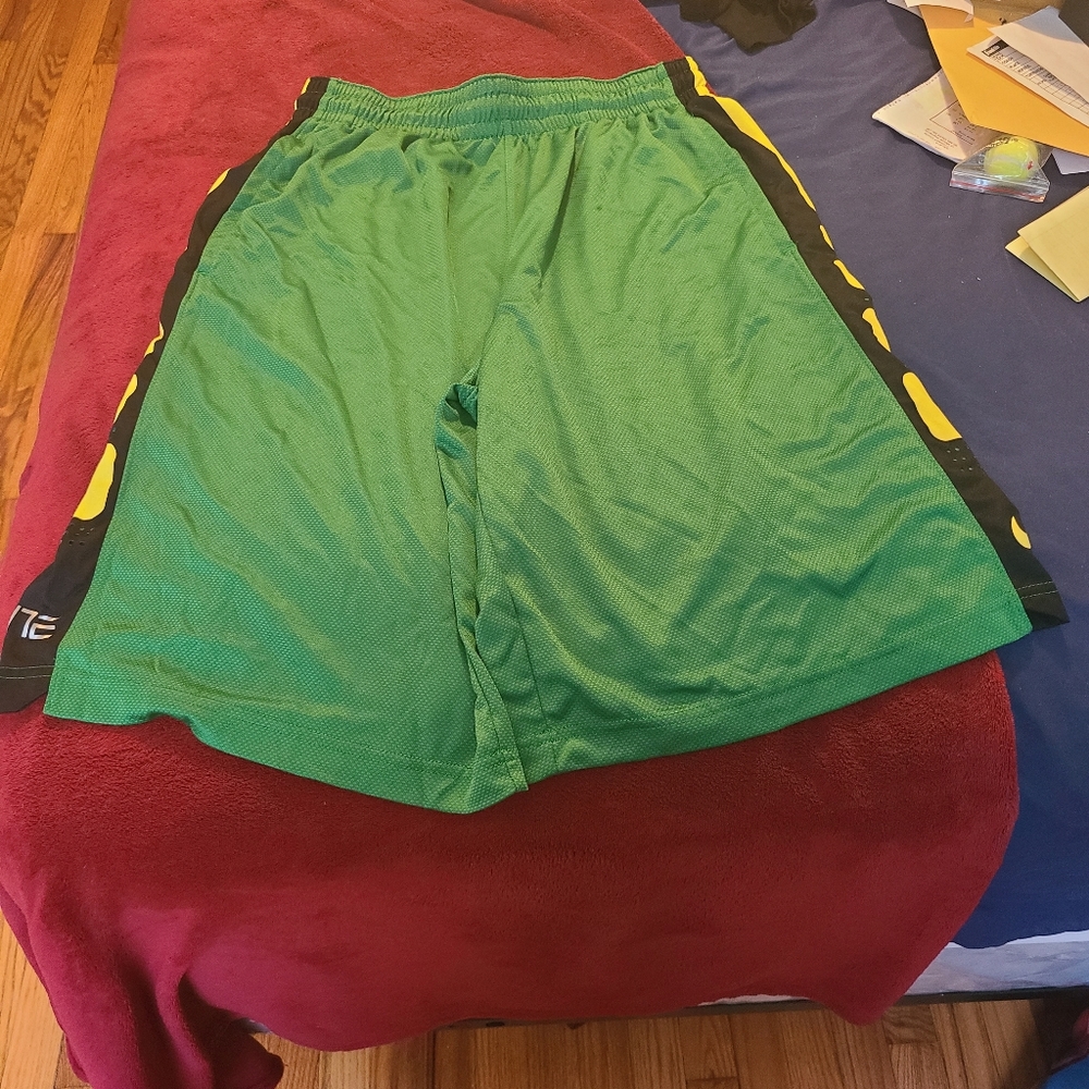 Nike elite shorts green gold